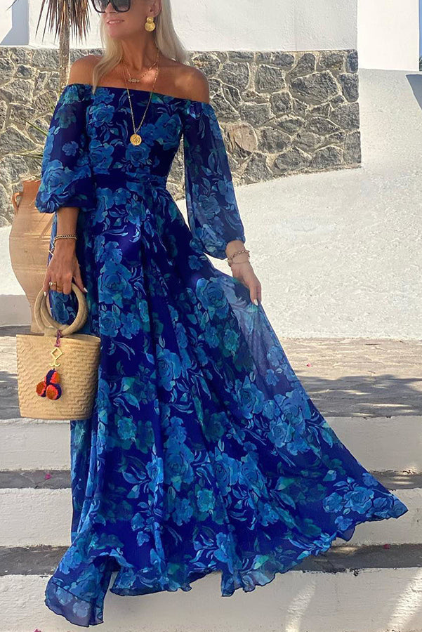 Ulla – Lång blomtrycksklänning med off-shoulder-ärmar