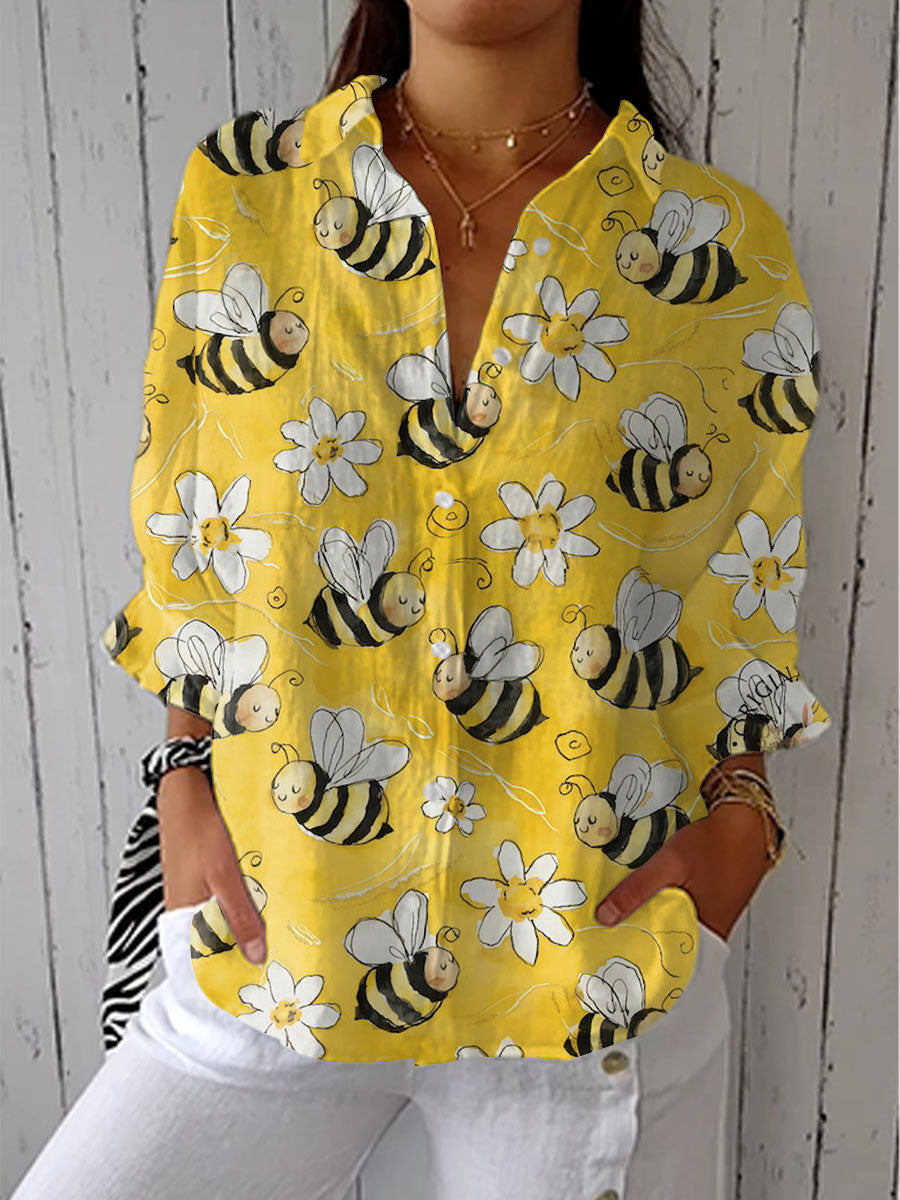 Agneta – Blommig blus med avslappnad passform i gult