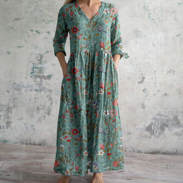 FAYE | MIDI BLOMMIG KLÄNNING MED HALVLÅNG ÄRM
